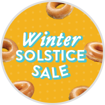 Heading that reads Winter Solstice Sale on an Orange Background with Original Glazed Doughnuts in motion around the heading