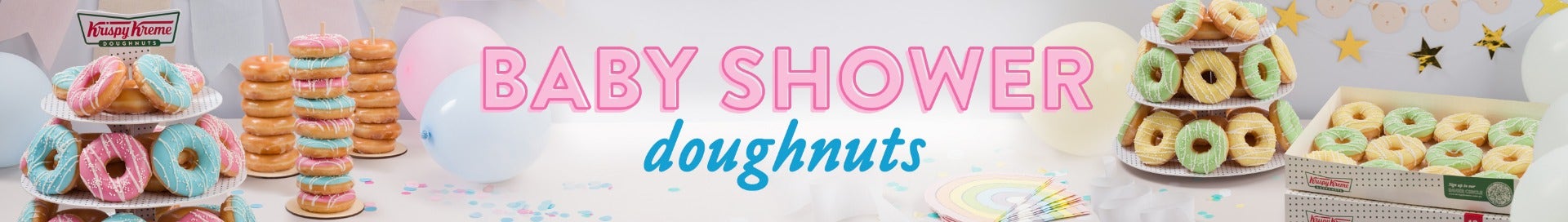 New Baby Shower Doughnut Range - Now available exclusively online! Baby Shower Party Packs showing the pink and blue baby shower doughnuts or the yellow and green baby shower donuts on the donut stand that is available on it's own or with the party pack. Decorations for a party add a pop of colour